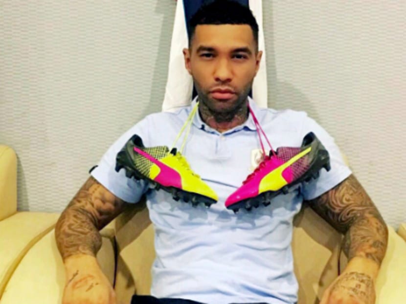 Jermaine Pennant posing with his PUMA boots. The former Liverpool and Arsenal star is willing to leave Tampines Rovers if it can alleviate the club's cash-flow problems. PHOTO: PUMA