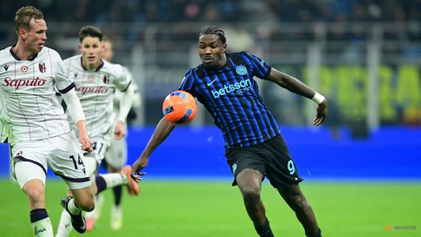 Inter surge past Bologna 3-1 to top Serie A standings