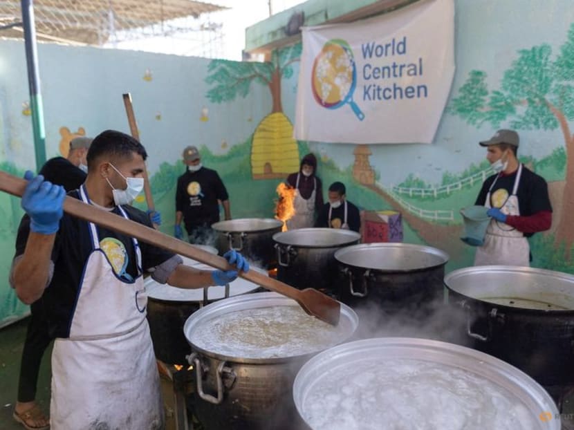 Members of "World Central Kitchen" prepare food for Palestinians, in the location given as Gaza, amid the ongoing conflict between Israel and Hamas, in this picture released on March 21, 2024 and obtained from social media.