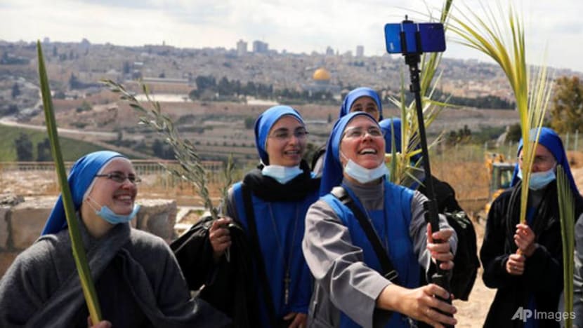 Christians mark Good Friday as some holy sites reopen amid COVID-19