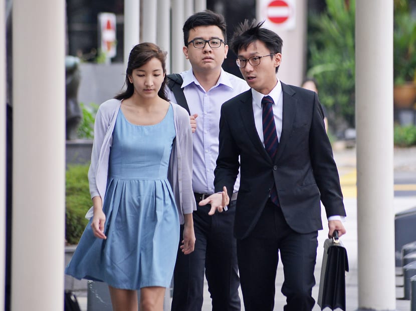 From left: Ai Takagi and Yang Kaiheng walking into the State Courts with their lawyer Choo Zheng Xi on Tuesday. Photo: Robin Choo From left: Ai Takagi and Yang Kaiheng walking into the State Courts with their lawyer Choo Zheng Xi on Tuesday. Photo: Robin Choo