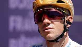 Evenepoel completes time-trial triple as Pogacar left trailing