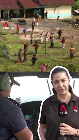 Indonesia floods: Helicopters deliver aid to cut-off villages