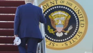 Heading to NATO summit, Trump casts doubt on mutual defence