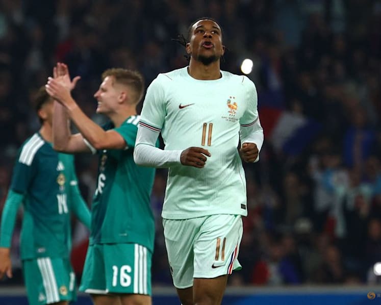 Olise stakes World Cup claim with hat-trick in France win