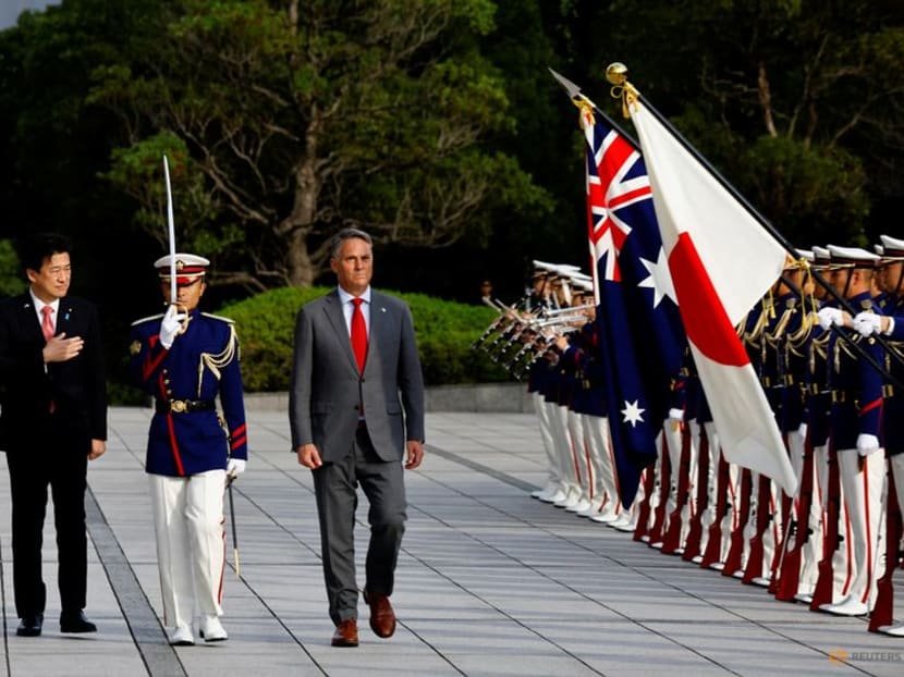 Japanese Defence Minister Minoru Kihara and Australia's Defence Minister and Deputy Prime Minister Richard Marles inspect an honor guard ahead of their meeting at the Defence Ministry in Tokyo, Japan, October 19, 2023. REUTERS/Kim Kyung-Hoon/Pool