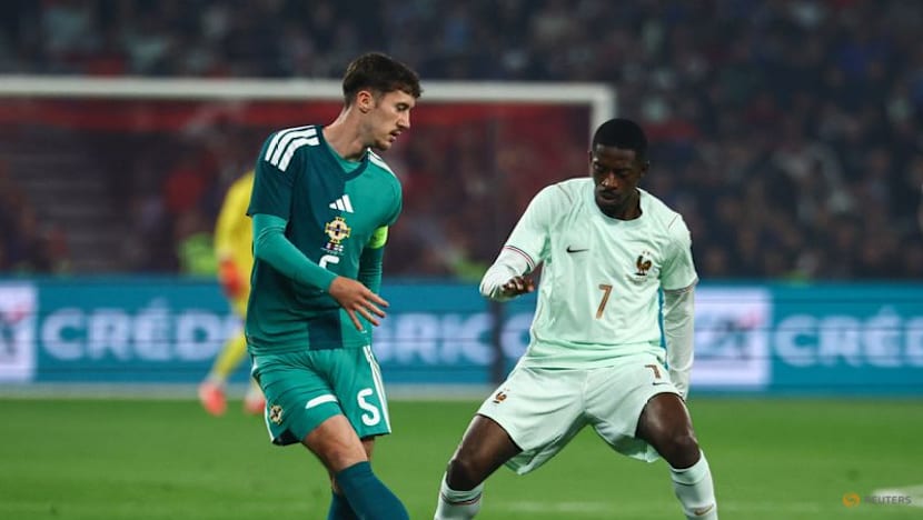Olise stakes World Cup claim with hat-trick in France win