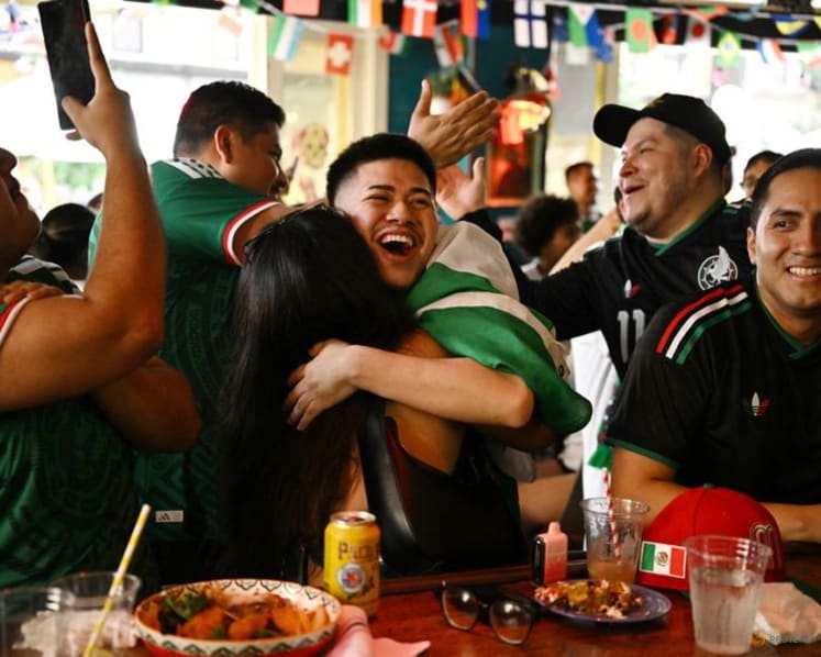 Mexicans celebrate breaking opening day curse with 2-0 win
