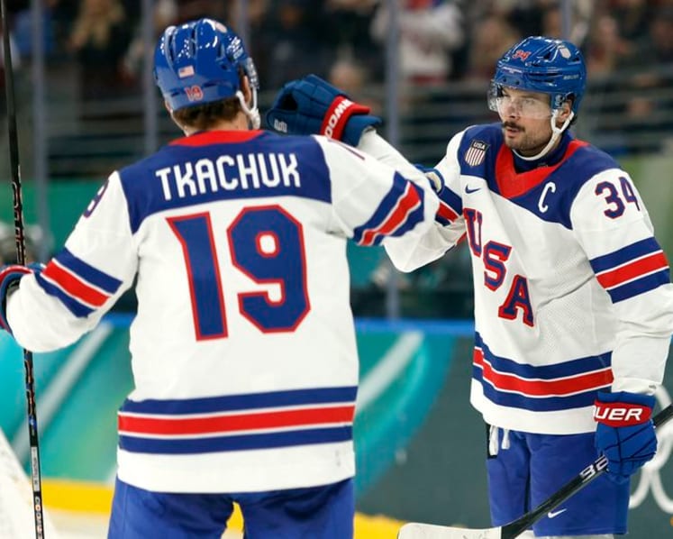 Ice hockey-Canada blank Czechs, US overpower Latvia, wins for Swiss and Germany