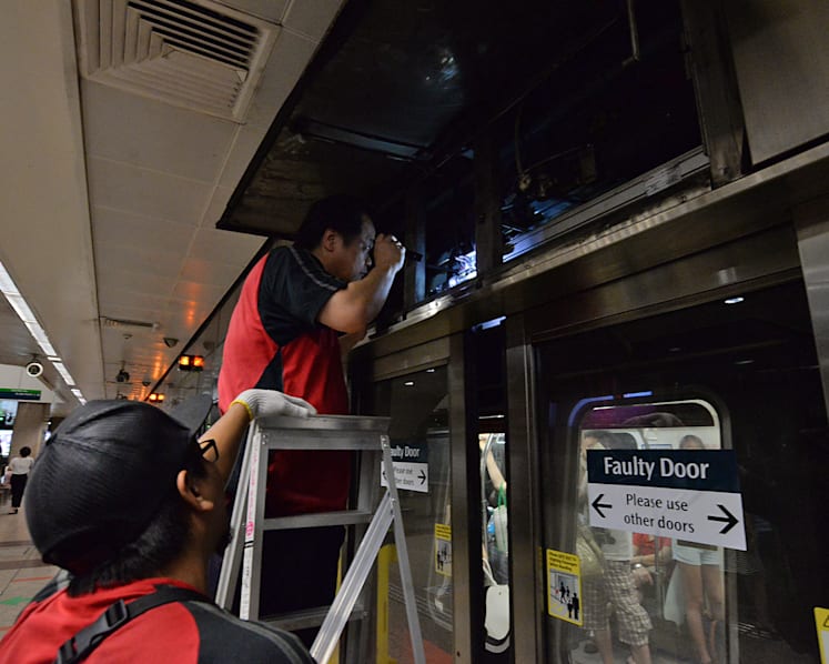 Gas leak from air-con pipe sends smoke into train, MRT station