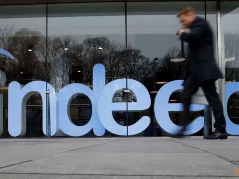 A man walks past the offices of Indeed in the centre of Dublin, Ireland on Feb 10, 2020.
