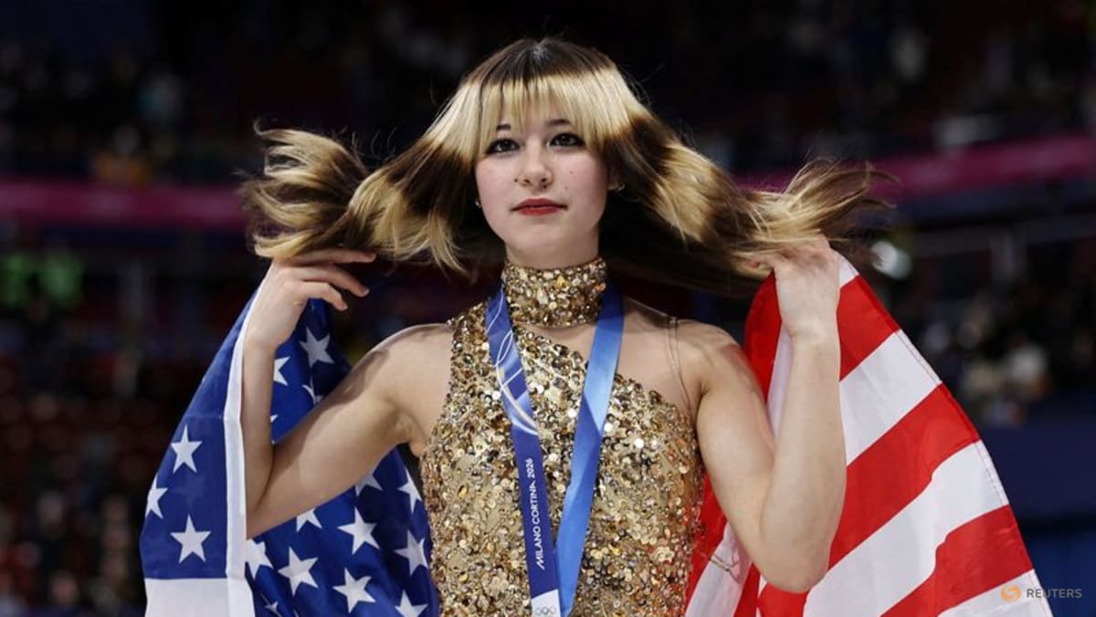 Figure skating-Dazzling Liu strikes gold to end US women's Olympic medal drought