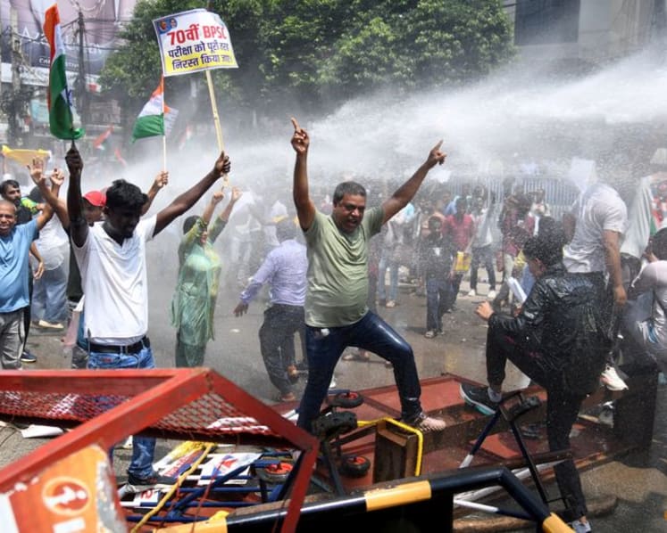 India police clash with protestors over jobs and exam transparency