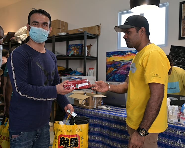 Power banks and Tiger Balms: 10,000 migrant workers get Christmas gifts in charity initiative