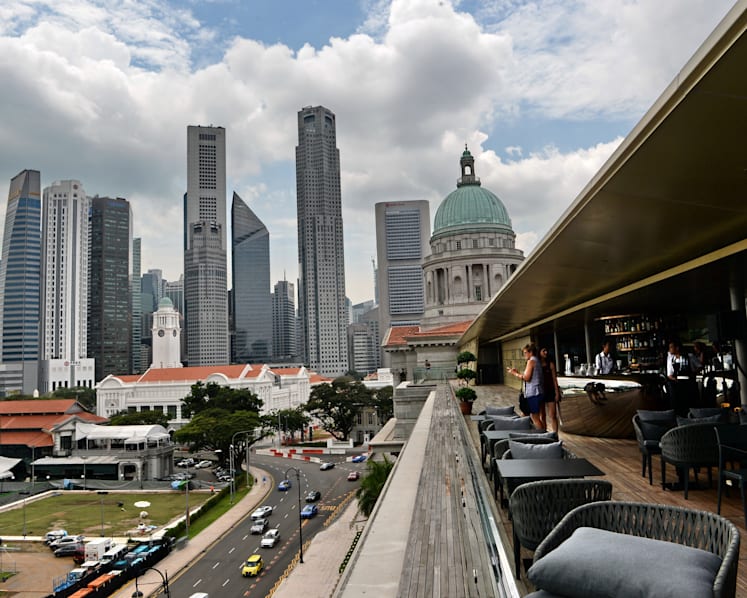 Q3 GDP growth beats estimates, but 2015 forecast cut to nearly 2%