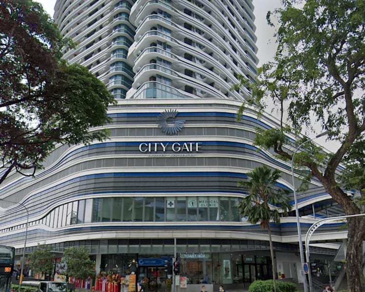 Woman, 37, charged with murder of a man at Beach Road condominium