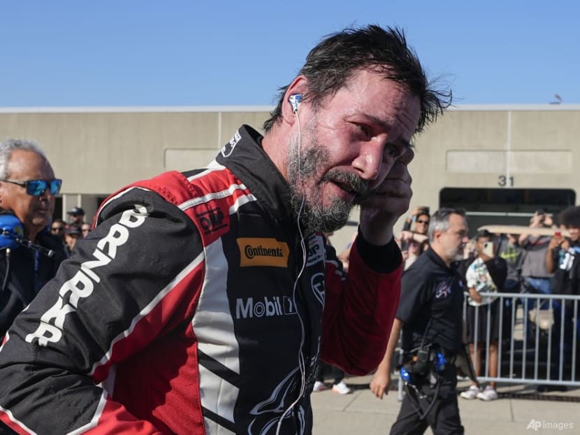 Keanu Reeves spins out at Indianapolis Motor Speedway in pro auto racing debut