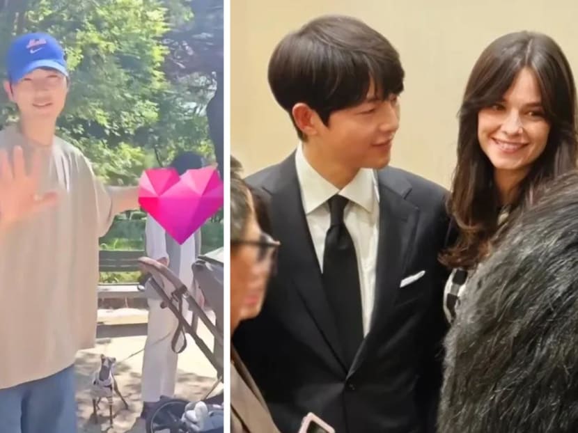 Song Joong-ki protects wife and son from fan trying to film them at the park Song Joong-ki protects wife and son from fan trying to film them at the park