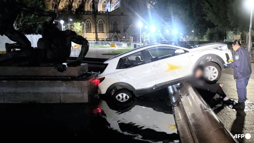 Frenchman eating McDonald's crashes into historic Sydney fountain, police say