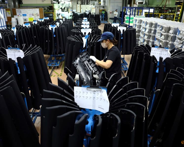 Japan manufacturers' mood edges up in May, services sector slips: Reuters poll