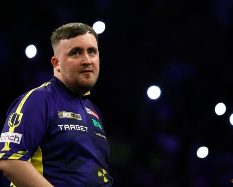 Darts-Littler goes back to bed after traffic jam ends tournament hopes