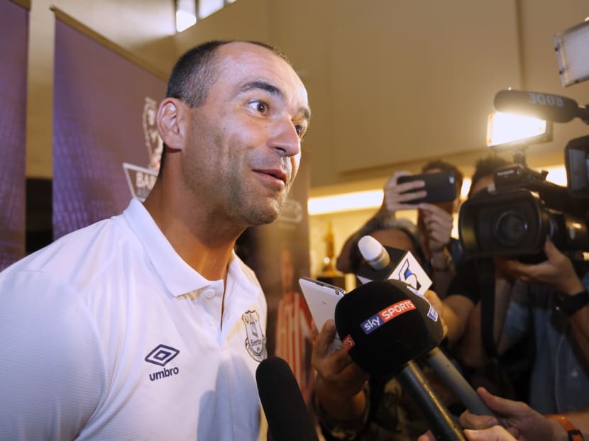 Arsenal, Everton land in S’pore