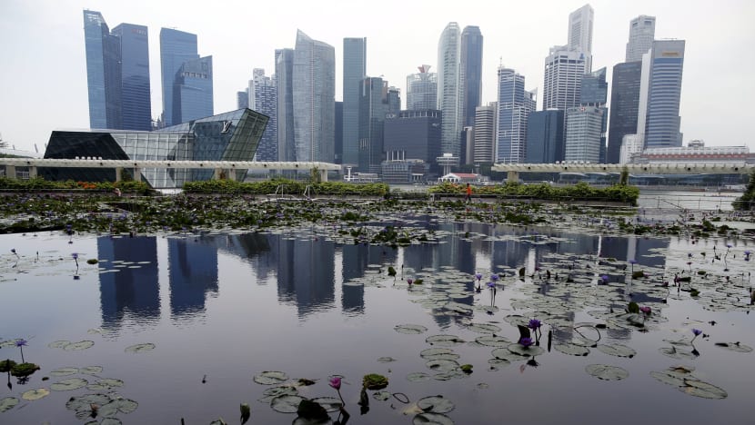 Some economists cut full-year growth forecasts