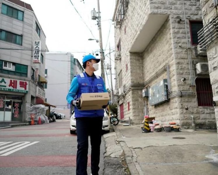 Commentary: Guaranteed next-day deliveries in South Korea are coming at a heavy price