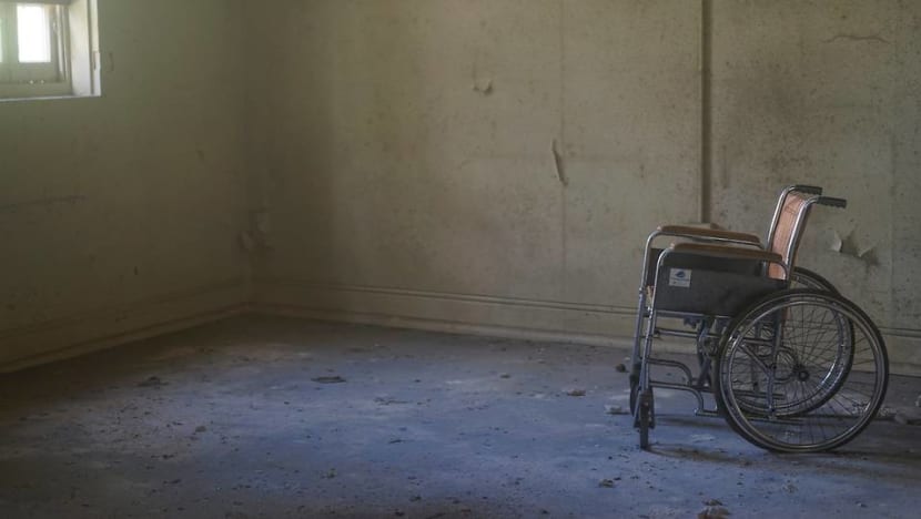 Nurse at old folks' home jailed for punching, kicking wheelchair-bound resident