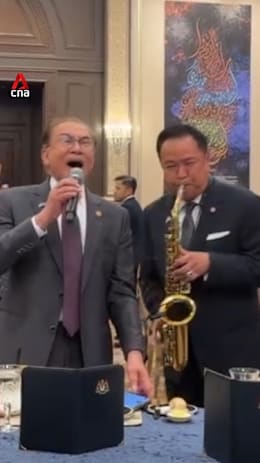 Thai PM Anutin plays saxophone while Anwar sings along