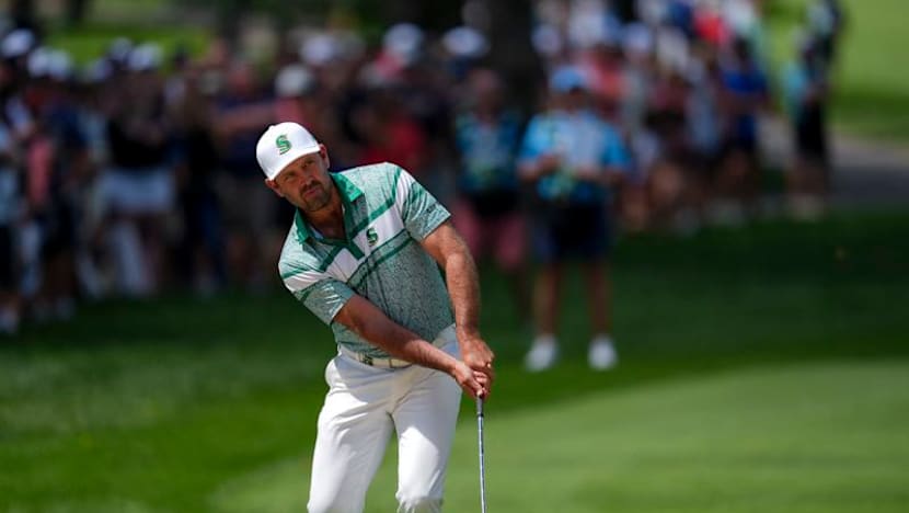 Schwartzel’s ball appears to be swallowed by a fish at LIV Golf Bedminster