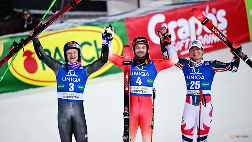 Alpine skiing-Swiss Meillard wins giant slalom under Schladming lights
