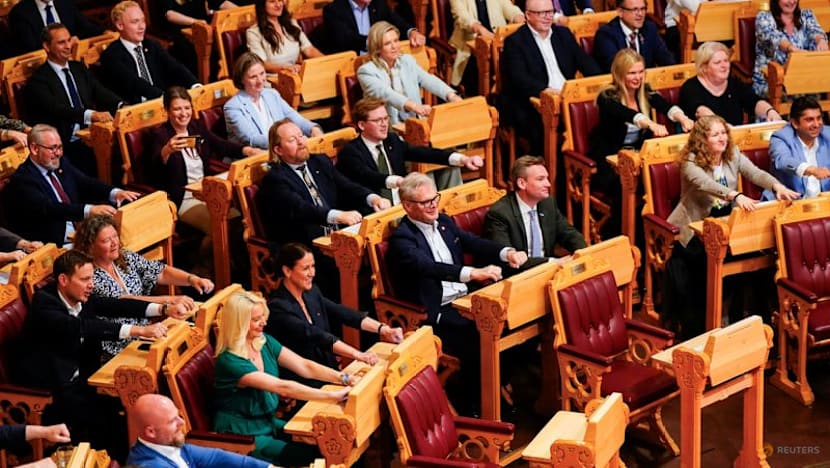 Norwegian parliament gets behind World Cup team with fans' Viking rowing display