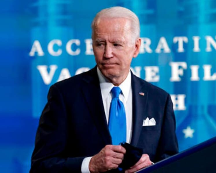 Biden boosts US COVID-19 vaccine stockpile as world waits