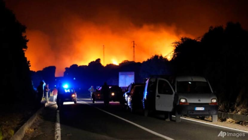 Fires ravage Italian island of Sardinia, forcing evacuations Fires ravage Italian island of Sardinia, forcing evacuations