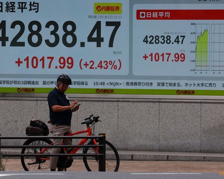 Japan's Nikkei rallies to record high, SoftBank surges