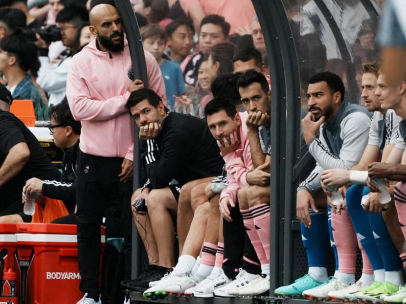 Inter Miami's Lionel Messi (centre) and his teammates sit on the substitute bench during their match against Hong Kong at the Hong Kong Stadium on Feb 4, 2024. Inter Miami's Lionel Messi (centre) and his teammates sit on the substitute bench during their match against Hong Kong at the Hong Kong Stadium on Feb 4, 2024.