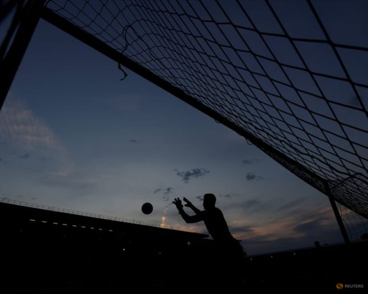 English soccer to trial goalkeeper injury rule to deter tactical stoppages