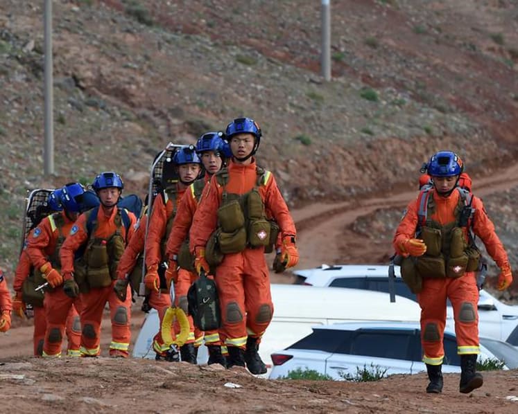 Families of 21 Chinese runners want answers over tragedy