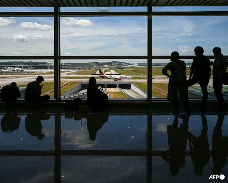 Malaysia Airports says global passenger processing system 'fully restored' after temporary disruption