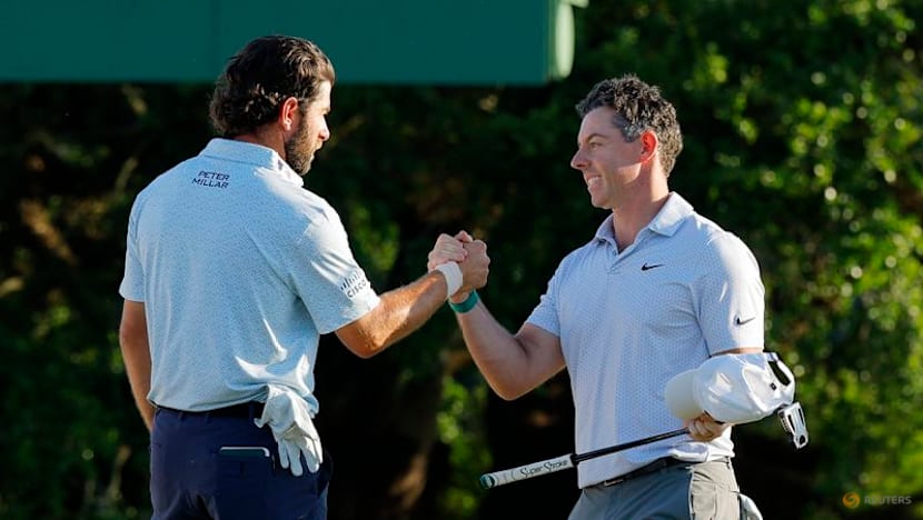 Carefree McIlroy strengthens grip on Masters title defence