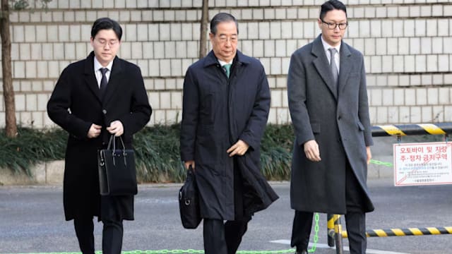 韩国前总理韩悳洙涉内乱罪被判监23年 当庭被捕