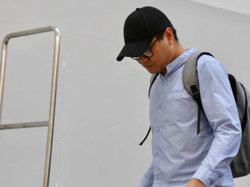 Joel Rasis Ismail leaving the State Courts on Oct 2. The NUS student allegedly filmed several female hostel residents showering.