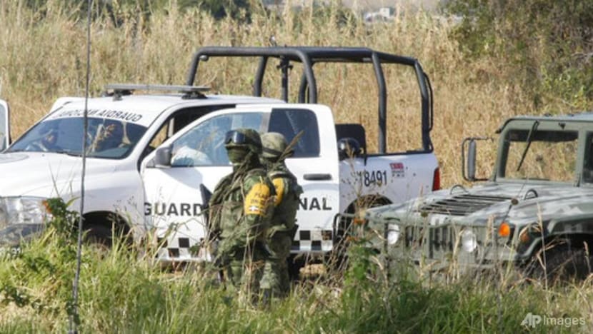 Searchers find 59 bodies in Mexico mass graves, dig for more
