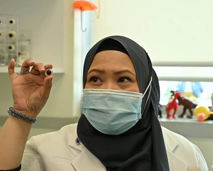 How this NUH expert makes artificial eyes to help patients be seen in a different light
