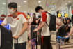 China's National Swimming Team Greeted By Fans At Changi Airport As They Arrive In SG For The World Aquatics Championships
