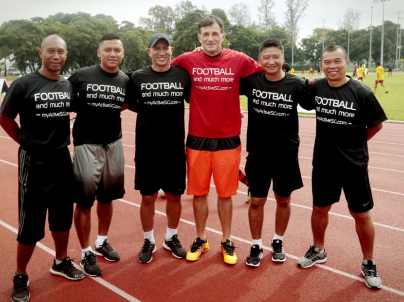 ActiveSG Football Academy  principal Aleksandar Duric (in red) welcomes new head coaches from left: Mohd Hairil Amin, Hyrizan Jufri, Robin Chitrakar, Richard Bok and Steven Tan. Photo: Jason Quah