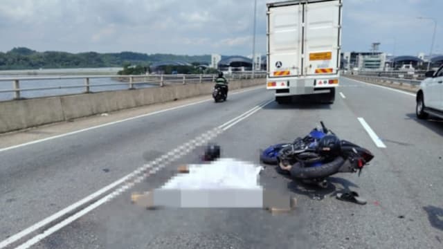 骑摩托车到狮城工作失控撞罗厘 马国夫妇一死一伤