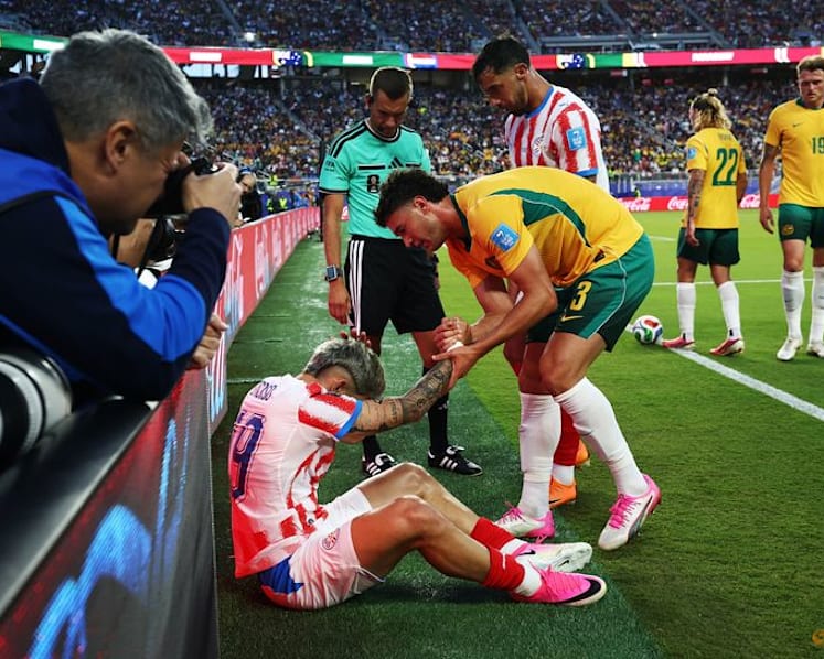 Paraguay coach concerned after player clatters into pitch-side advertising boards