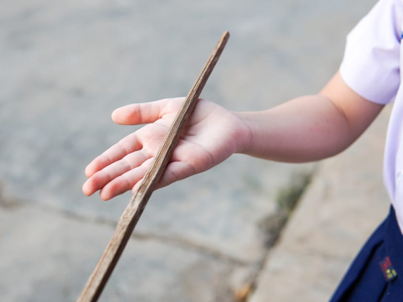 Commentary: Singapore parents need to let go of the cane and guilt Commentary: Singapore parents need to let go of the cane and guilt